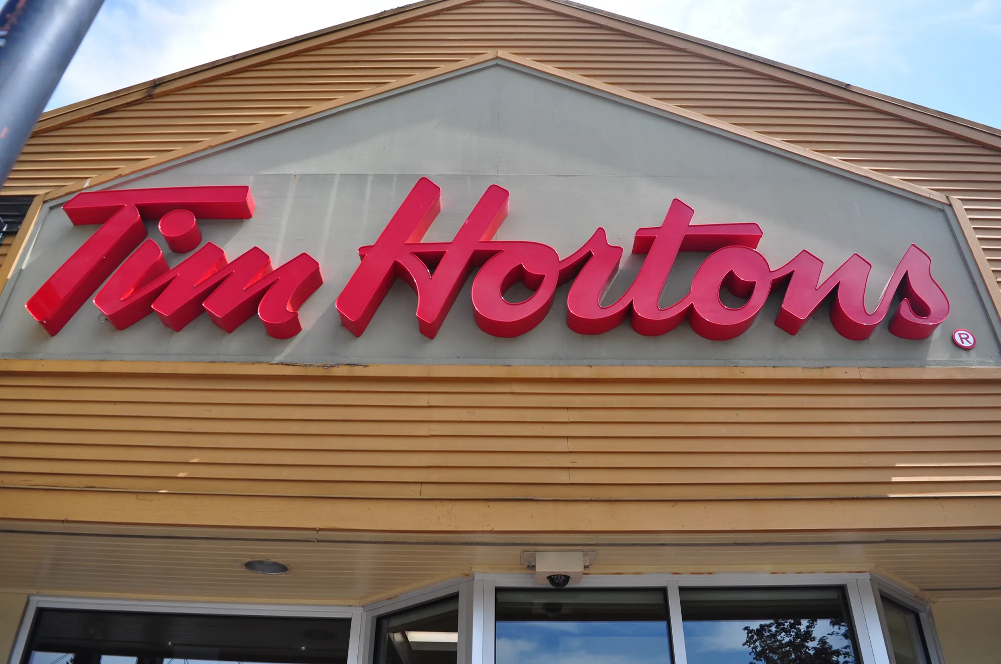 Tim Hortons red script channel-letter sign in Vancouver